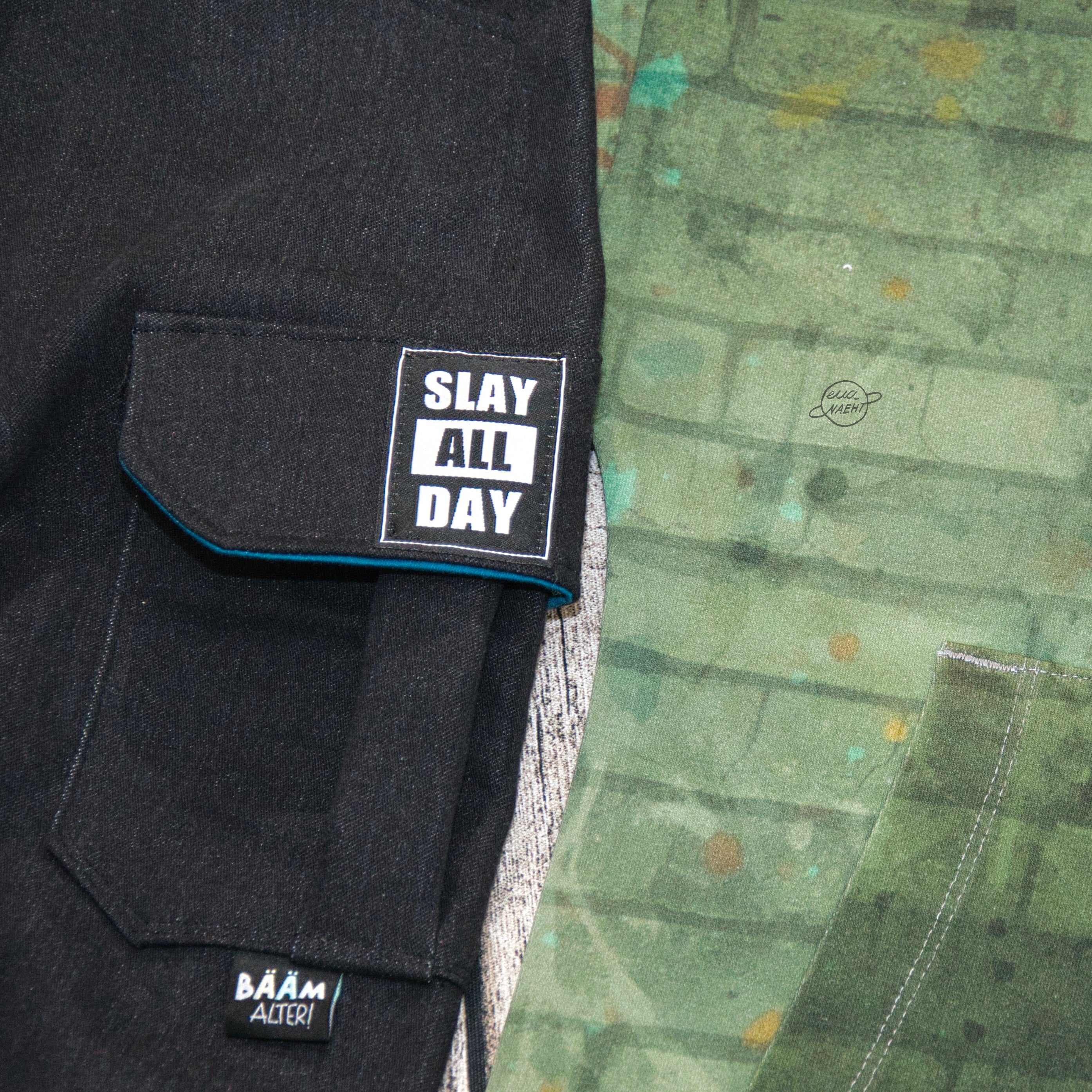 Web label “Slay all day”