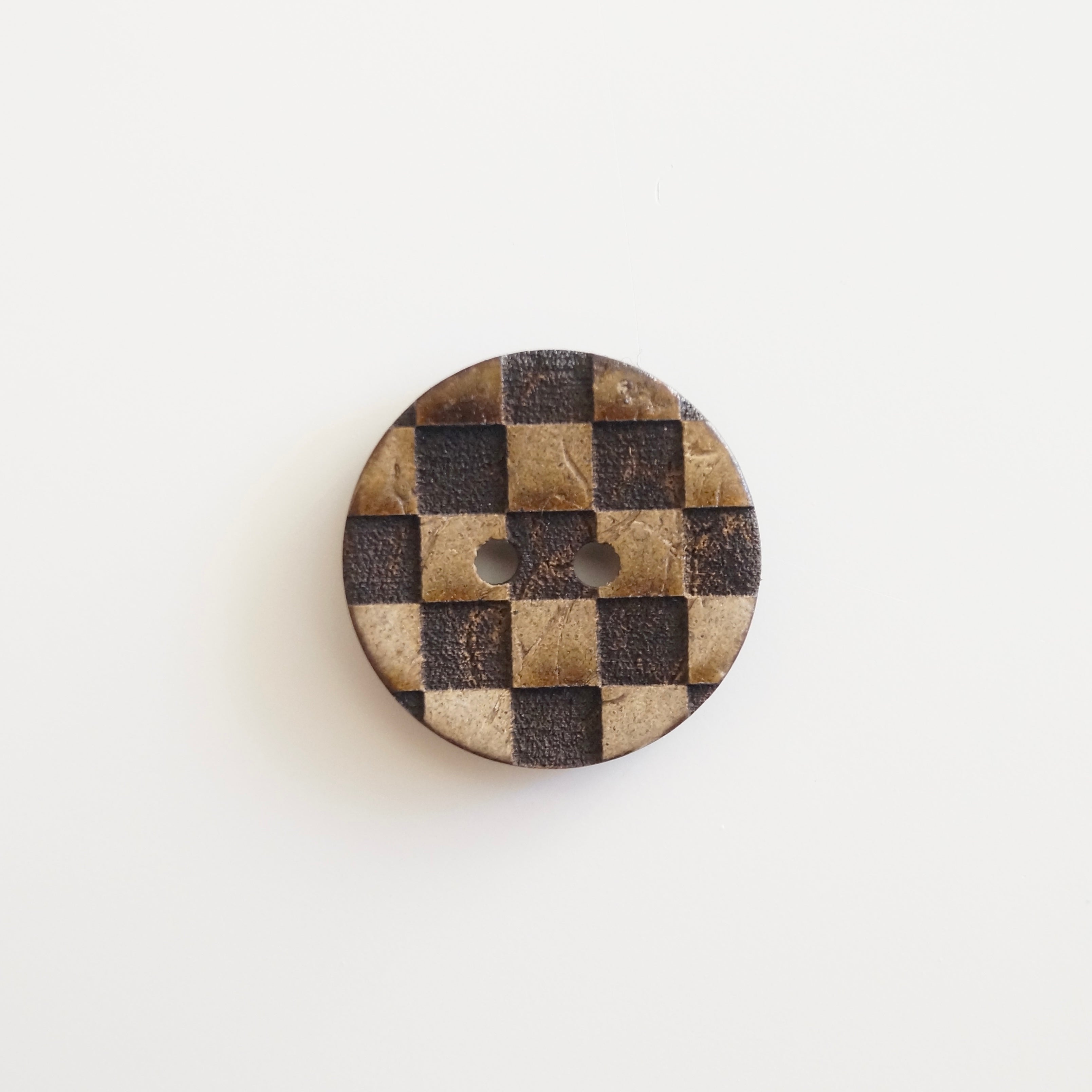 Checkerboard button