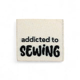 Set of 3 woven labels “Addicted to Sewing”
