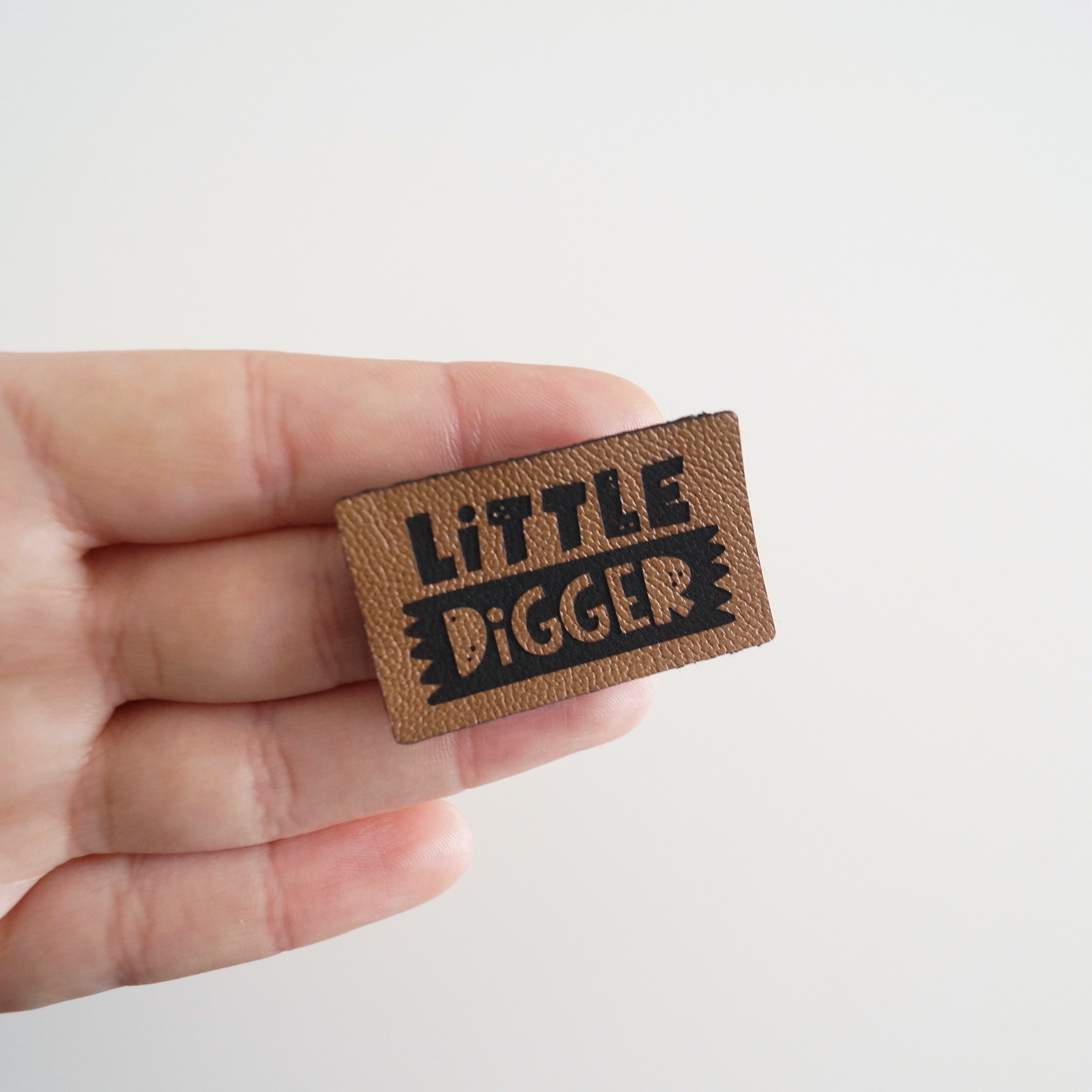 Faux leather label “Little Digger”